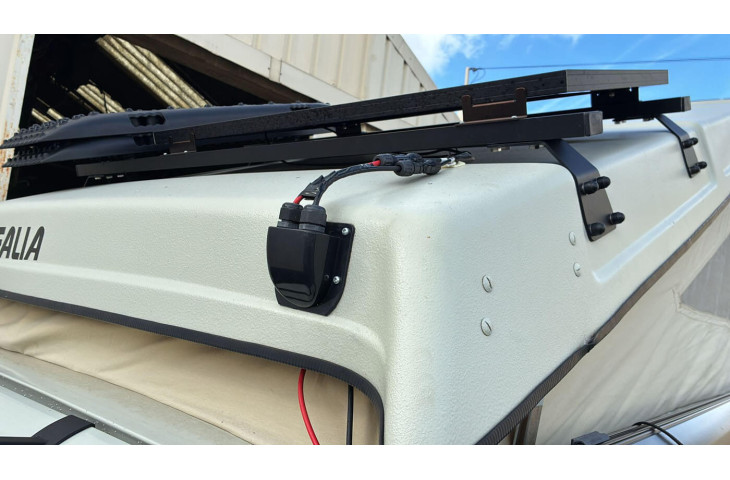 Barre de toit pour toit relevable