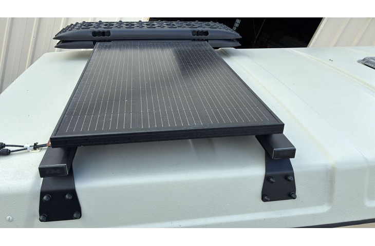 Barre de toit pour toit relevable