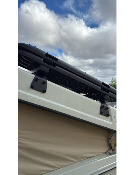 Barre de toit pour toit relevable